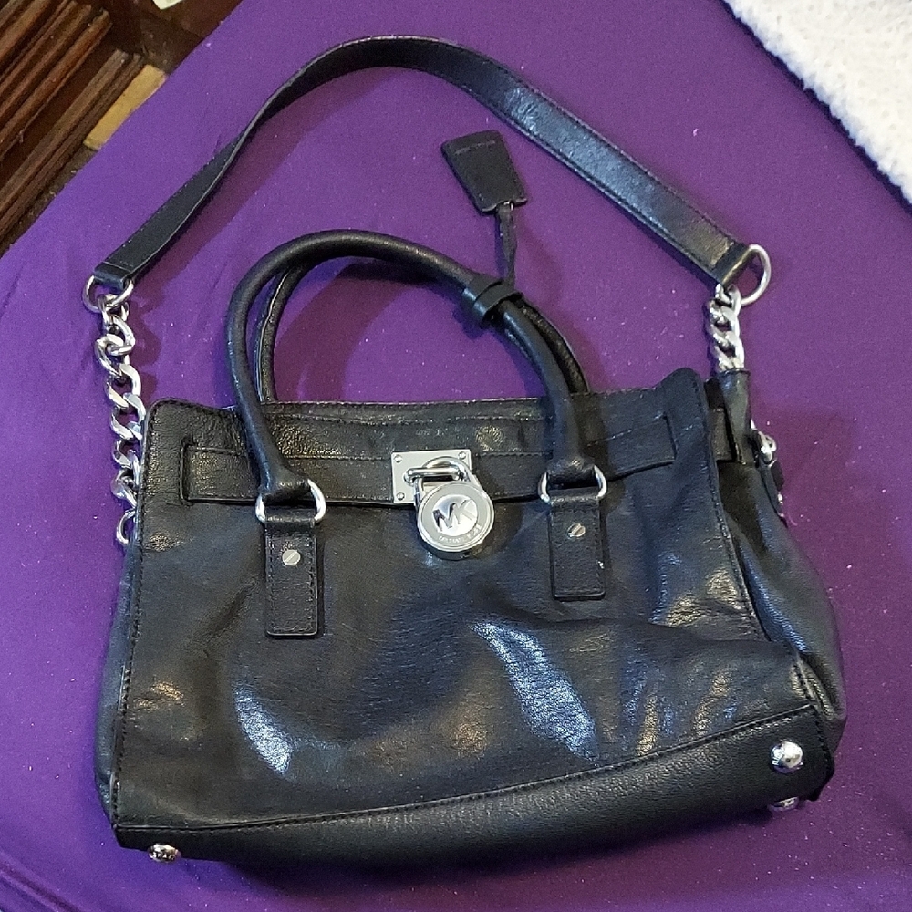 Edgy Michael Kors Black Leather Handbag With Chain and Lock.